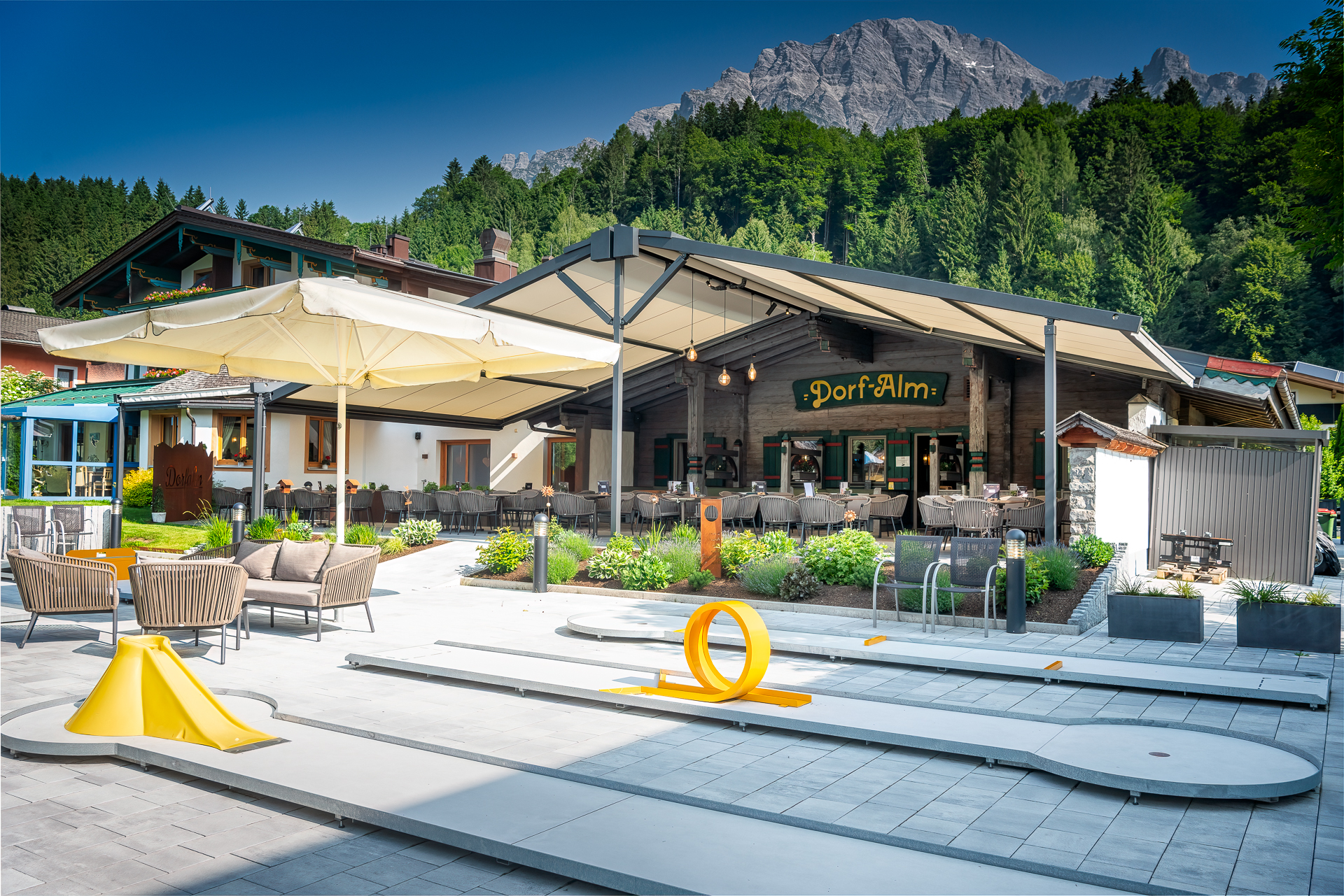 Dorf-Alm with covered terrace and mountain panorama