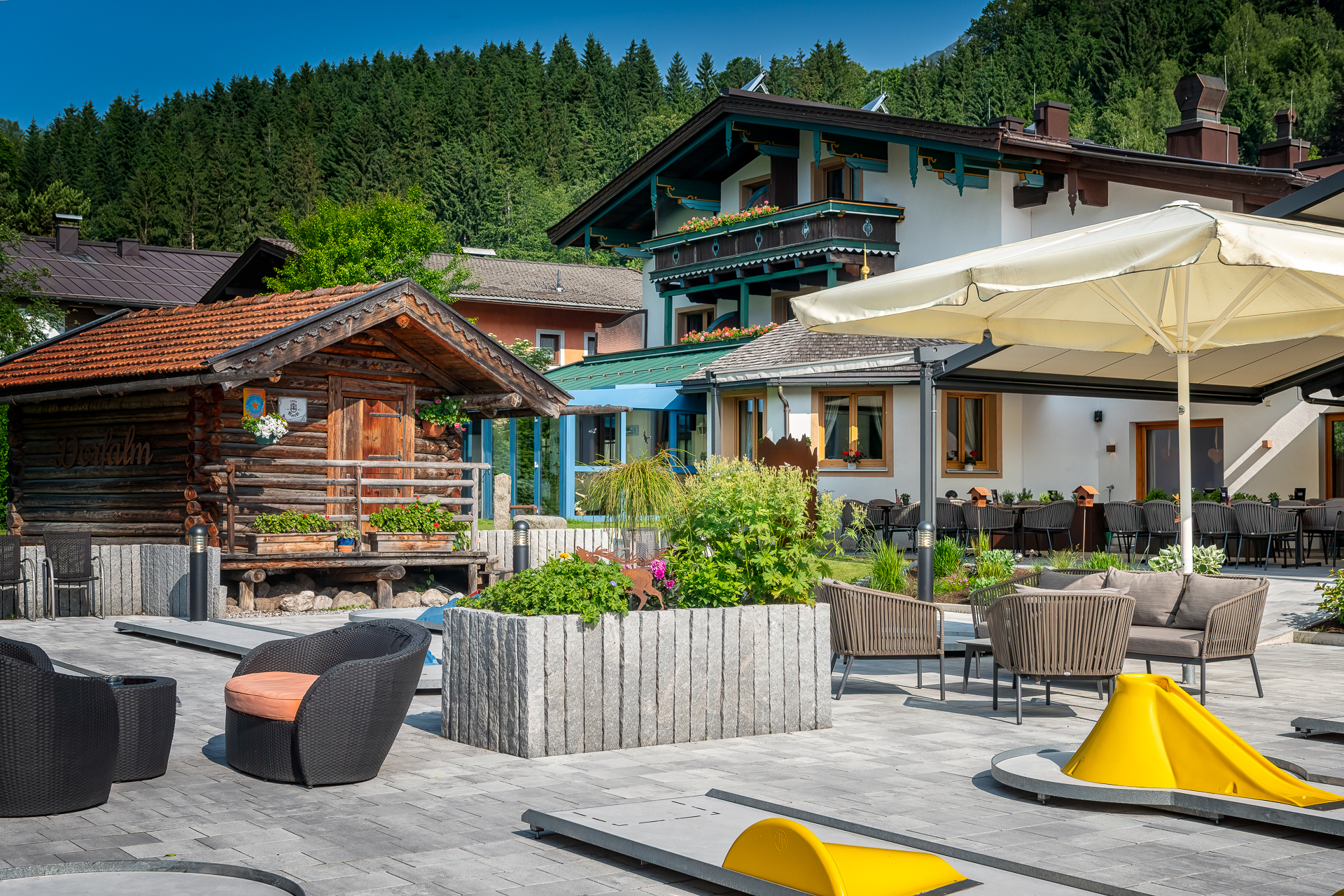 Mini golf course with lounge area in front of the Dorf-Alm